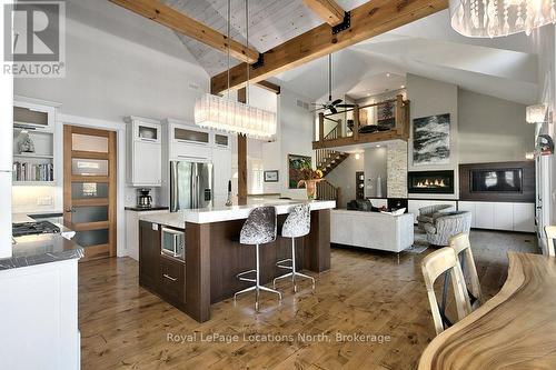 174 High Bluff Lane, Blue Mountains, ON - Indoor Photo Showing Kitchen With Fireplace With Upgraded Kitchen