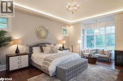 Primary Suite complete with kitchentte, fireplace, his & her dressing rooms, a private study / library & laundry! - 