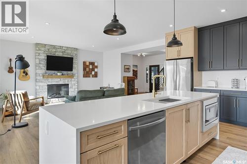 518 Hamm Crescent, Saskatoon, SK - Indoor Photo Showing Kitchen With Fireplace