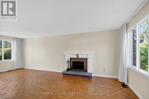 Living Room - 1264 Morrison Drive, Ottawa, ON - Indoor Photo Showing Living Room With Fireplace