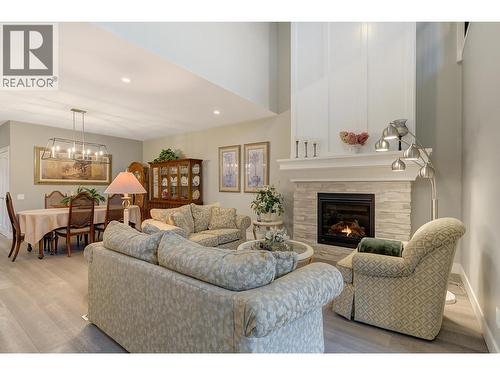 1940 Klo Road Unit# 7, Kelowna, BC - Indoor Photo Showing Living Room With Fireplace