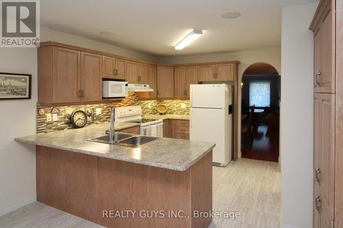 233 Odette Road, Peterborough (Monaghan Ward 2), ON - Indoor Photo Showing Kitchen With Double Sink