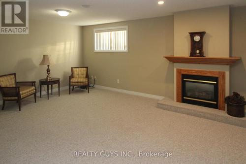 233 Odette Road, Peterborough (Monaghan Ward 2), ON - Indoor Photo Showing Other Room With Fireplace