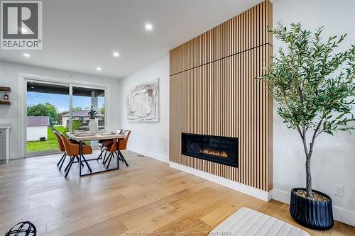 8319 Annie, Mcgregor, ON - Indoor Photo Showing Other Room With Fireplace