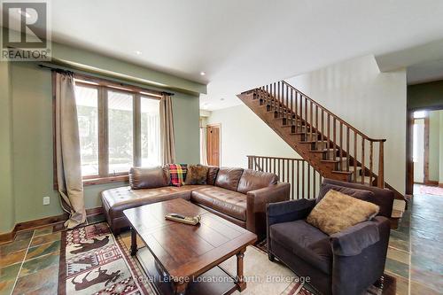 The Family Room Overlooks the Backyard - 118 Venture Boulevard, Blue Mountains, ON - Indoor Photo Showing Living Room