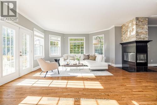 38 Marchvale Drive, Ottawa, ON - Indoor Photo Showing Living Room With Fireplace