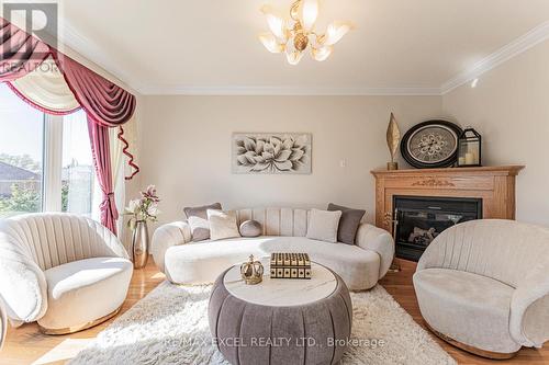 65 Falling River Drive, Richmond Hill, ON - Indoor Photo Showing Living Room With Fireplace