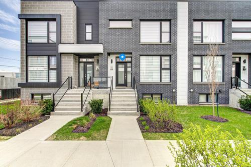 Façade - 213 Rue D'Ambre, Candiac, QC 