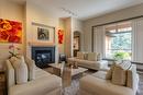 12-4100 Gallaghers Parkland, Kelowna, BC  - Indoor Photo Showing Living Room With Fireplace 