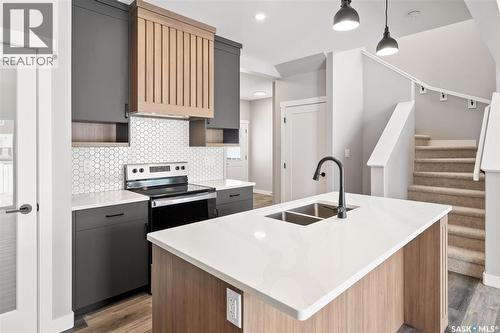 214 Fortosky Crescent, Saskatoon, SK - Indoor Photo Showing Kitchen With Double Sink With Upgraded Kitchen