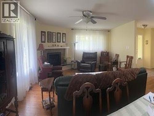 2455 5Th Avenue Ne, Salmon Arm, BC - Indoor Photo Showing Living Room With Fireplace