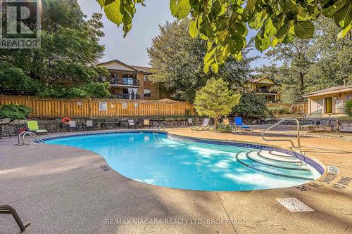 307 - 81 Scott Street, St. Catharines (Lakeport), ON - Outdoor With In Ground Pool With Backyard