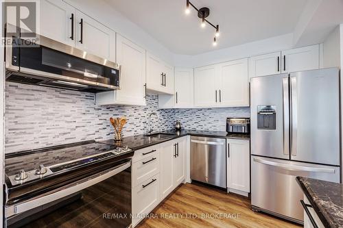 307 - 81 Scott Street, St. Catharines (Lakeport), ON - Indoor Photo Showing Kitchen With Stainless Steel Kitchen With Upgraded Kitchen