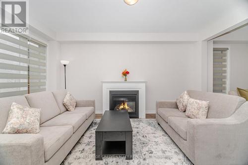 15 Weylie Street, Hamilton, ON - Indoor Photo Showing Living Room With Fireplace
