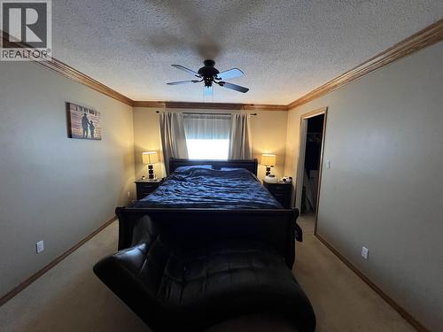 5551 Maxhamish Crescent, Fort Nelson, BC - Indoor Photo Showing Bedroom