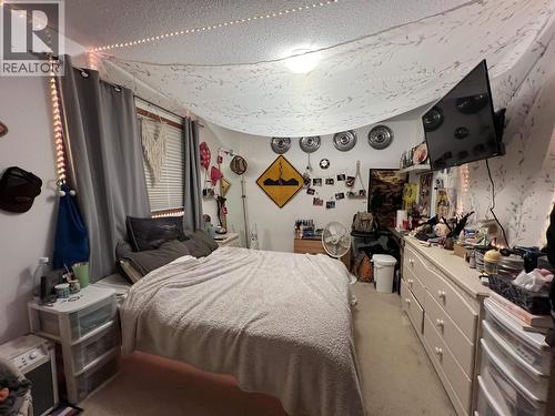 5551 Maxhamish Crescent, Fort Nelson, BC - Indoor Photo Showing Bedroom