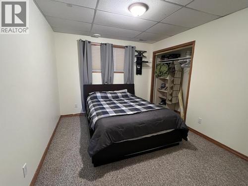 5551 Maxhamish Crescent, Fort Nelson, BC - Indoor Photo Showing Bedroom
