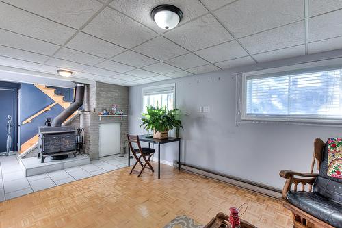 Salle familiale - 762 Rue Comber, Longueuil (Greenfield Park), QC - Indoor Photo Showing Other Room With Fireplace