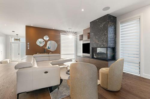 Salon - 769 Rue Louis-Quilico, Boucherville, QC - Indoor With Fireplace