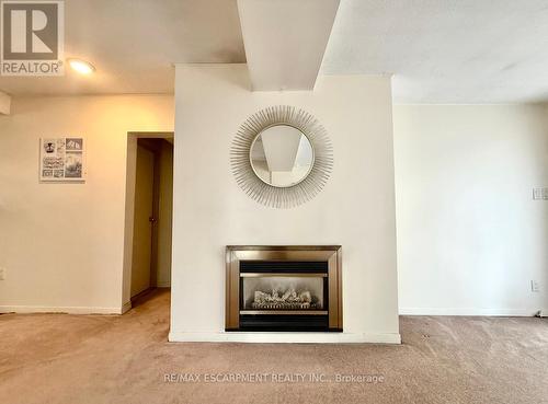115 Beach Boulevard, Hamilton, ON - Indoor Photo Showing Living Room With Fireplace