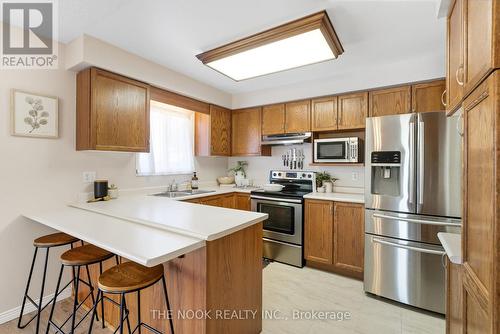 58 Stagemaster Crescent, Clarington (Courtice), ON - Indoor Photo Showing Kitchen With Stainless Steel Kitchen With Double Sink