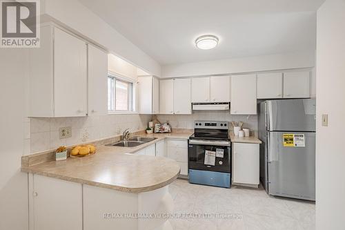 7137 Madiera Road, Mississauga, ON - Indoor Photo Showing Kitchen With Stainless Steel Kitchen With Double Sink
