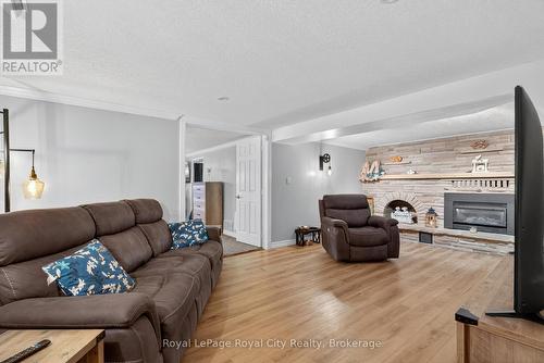Down to the basement - 68 Sunset Boulevard, Cambridge, ON - Indoor Photo Showing Living Room With Fireplace