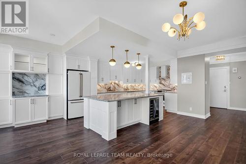 8 ft islan/ breakfast bar/wine fridge/Cafe appl. - 2509/2510 - 515 St Laurent Boulevard, Ottawa, ON - Indoor Photo Showing Kitchen With Upgraded Kitchen