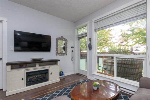 108-938 Dunford Ave, Langford, BC - Indoor Photo Showing Living Room With Fireplace