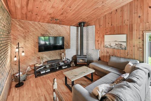 Family room - 414 Boul. D'Iberville, Saint-Jean-Sur-Richelieu, QC - Indoor Photo Showing Living Room With Fireplace