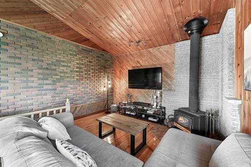 Family room - 414 Boul. D'Iberville, Saint-Jean-Sur-Richelieu, QC - Indoor Photo Showing Living Room With Fireplace