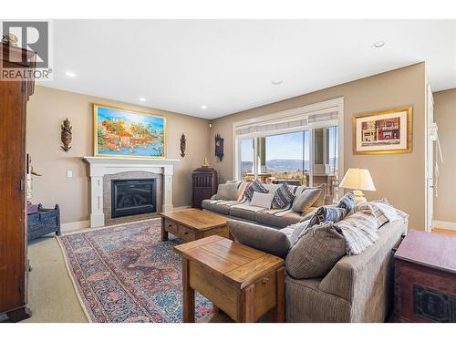 5450 South Perimeter Way, Kelowna, BC - Indoor Photo Showing Living Room With Fireplace