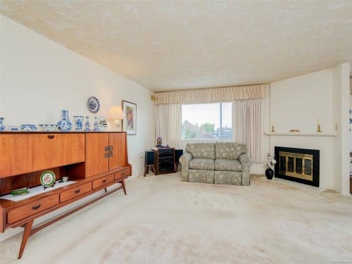 301-2354 Brethour Ave, Sidney, BC - Indoor Photo Showing Living Room With Fireplace