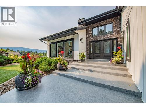 Spacious walkway to front entrance - 702 Cypress Drive, Coldstream, BC - Outdoor