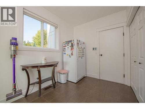 Entry from garage - 702 Cypress Drive, Coldstream, BC - Indoor Photo Showing Other Room