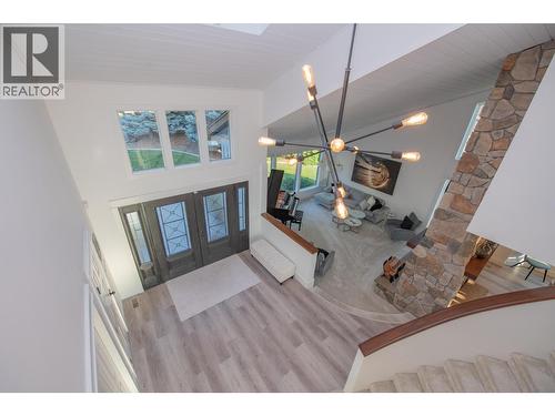 Vaulted Ceilings - 702 Cypress Drive, Coldstream, BC - Indoor Photo Showing Other Room
