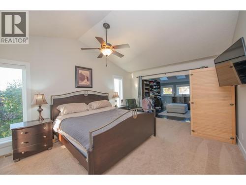 Master Bedroom (1 of 4 bedrooms upstairs) - 702 Cypress Drive, Coldstream, BC - Indoor Photo Showing Bedroom