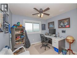 4 of 4 bedrooms upstairs, currently used as office - 