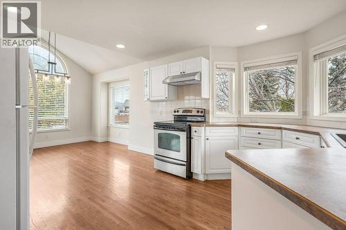 Kitchen to right of lobby - 974 Mt. Beaven Place, Vernon, BC - Indoor Photo Showing Kitchen