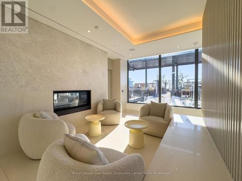 1307 - 28 Ann Street, Mississauga, ON - Indoor Photo Showing Living Room With Fireplace