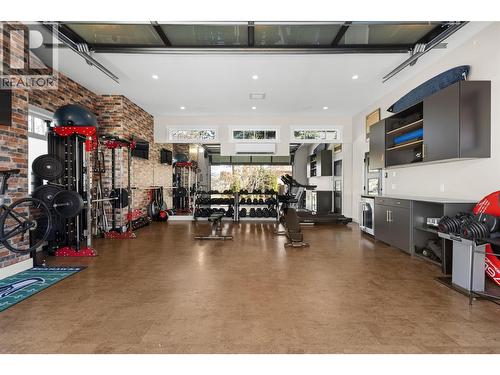 Gym with built ins & fridge - 539 Metcalfe Avenue, Kelowna, BC - Indoor Photo Showing Other Room