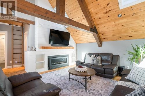Loft lounge with fireplace - 589108 Grey Road 19, Blue Mountains, ON - Indoor Photo Showing Living Room With Fireplace