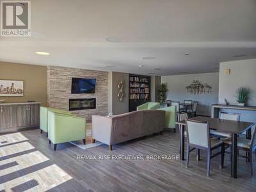 601 - 121 Queen Street, Kingston (East Of Sir John A. Blvd), ON - Indoor With Fireplace