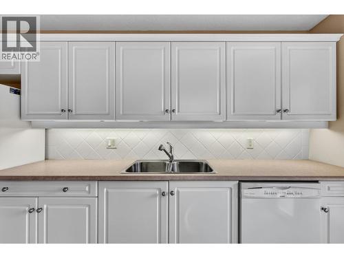 305 Whitman Road Unit# 102, Kelowna, BC - Indoor Photo Showing Kitchen With Double Sink