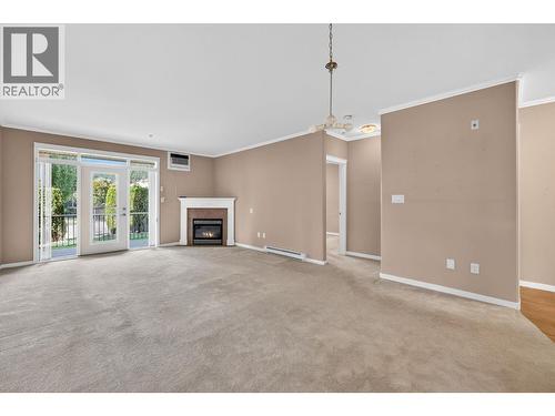 305 Whitman Road Unit# 102, Kelowna, BC - Indoor With Fireplace