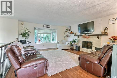 21 Maple Place, Birch Hills, SK - Indoor Photo Showing Living Room With Fireplace