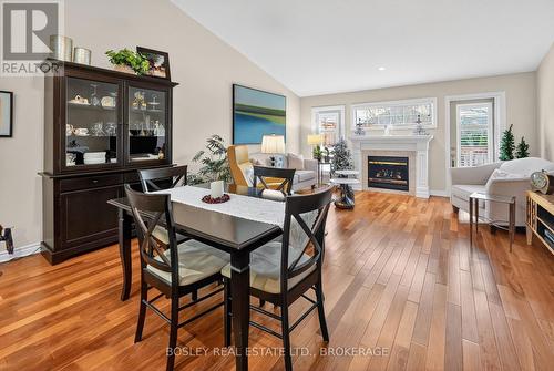 AND DINING / GREAT RO0M.. - 3 - 21 Loretta Drive W, Niagara-On-The-Lake (Virgil), ON - Indoor With Fireplace