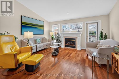 VAULTED CEILING ...GAS FIREPLACE... - 3 - 21 Loretta Drive W, Niagara-On-The-Lake (Virgil), ON - Indoor Photo Showing Living Room With Fireplace