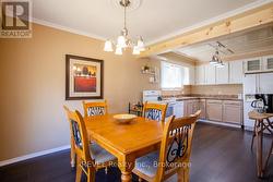 Nice open layout between kitchen & dining space. - 