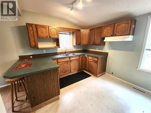 1233 2Nd Street, Estevan, SK - Indoor Photo Showing Kitchen With Double Sink